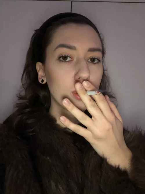 only a cigarette can warm my lungs when it's cold outside