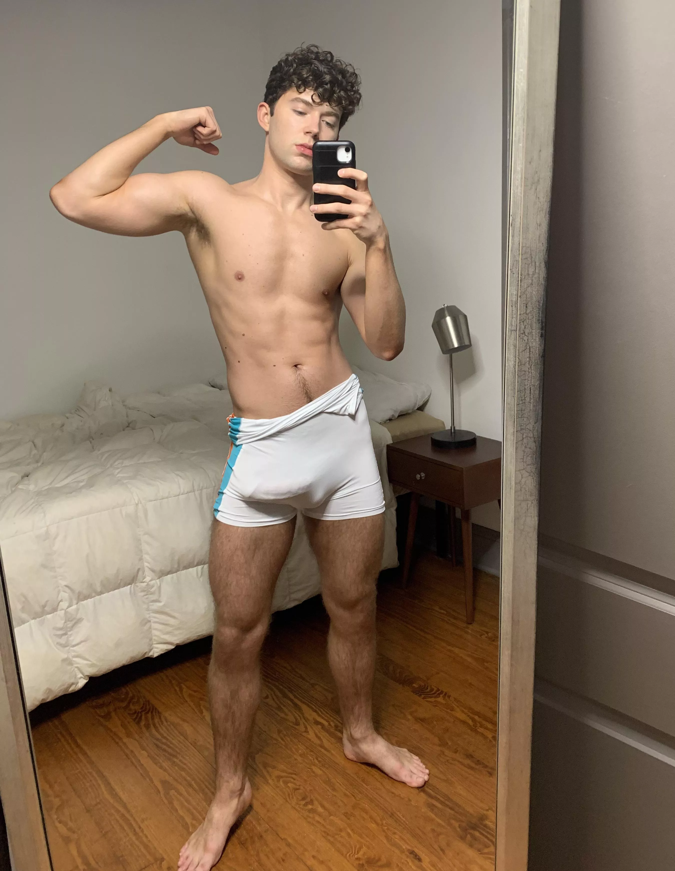 Wanna pin each other down in my bed and feel my thick cock bulge thru my singlet?