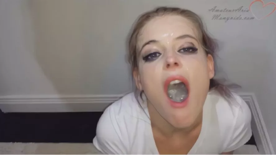 Holding it In her mouth