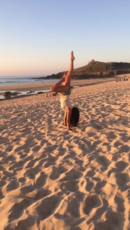 Handstand on a beach