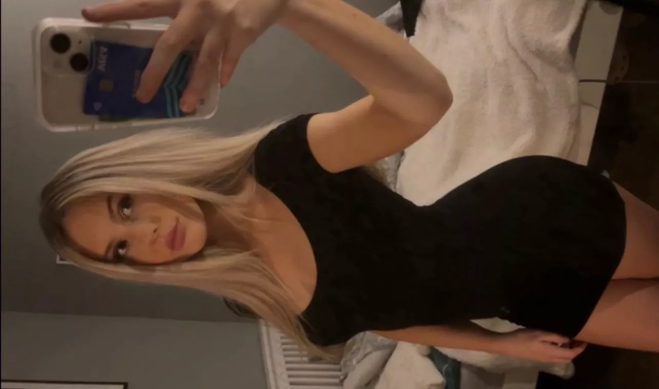 Curvy chav in a black dress