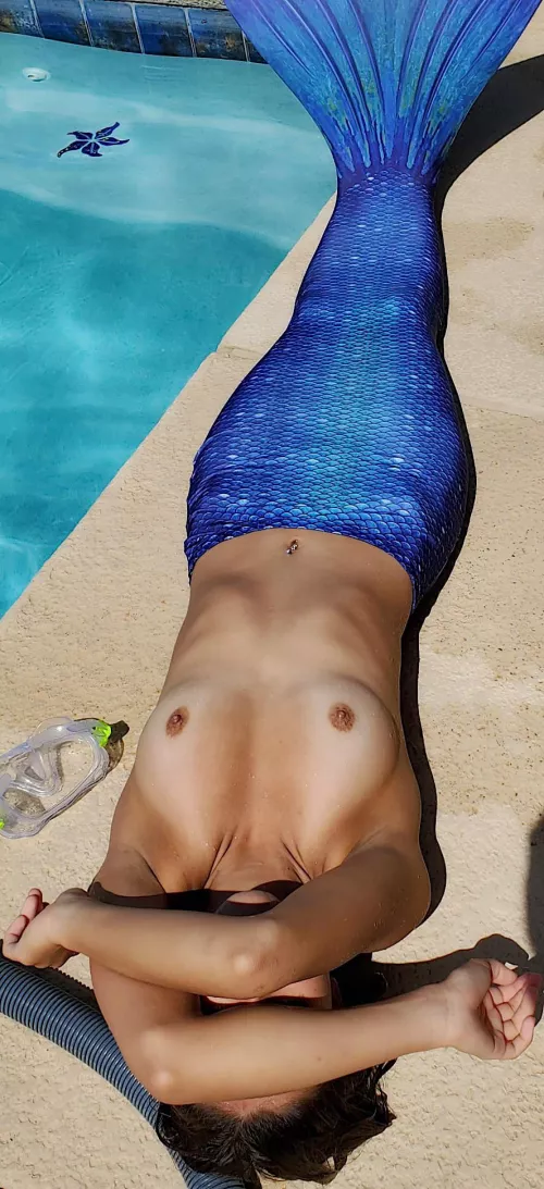 A real mermaid is topless c:
