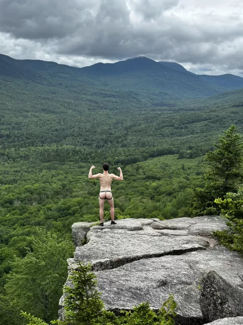 At the summit in nothing but a jockstrap