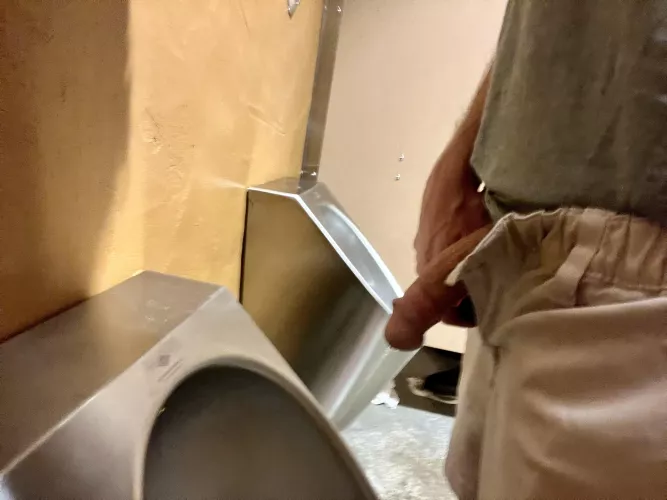 I hope the guy walking out of the stall saw my cock growing