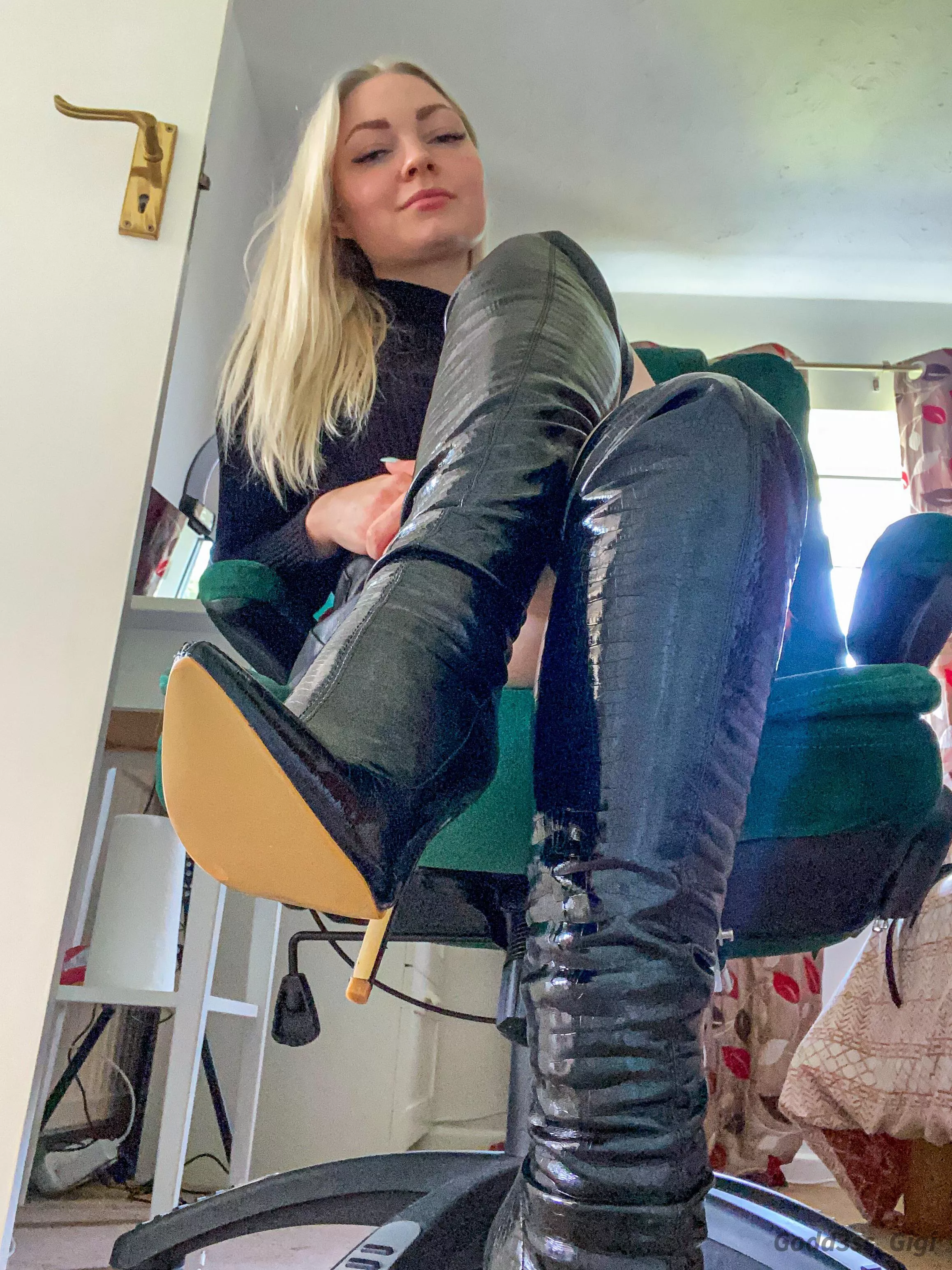 You can’t resist a shiny knee high PVC boot