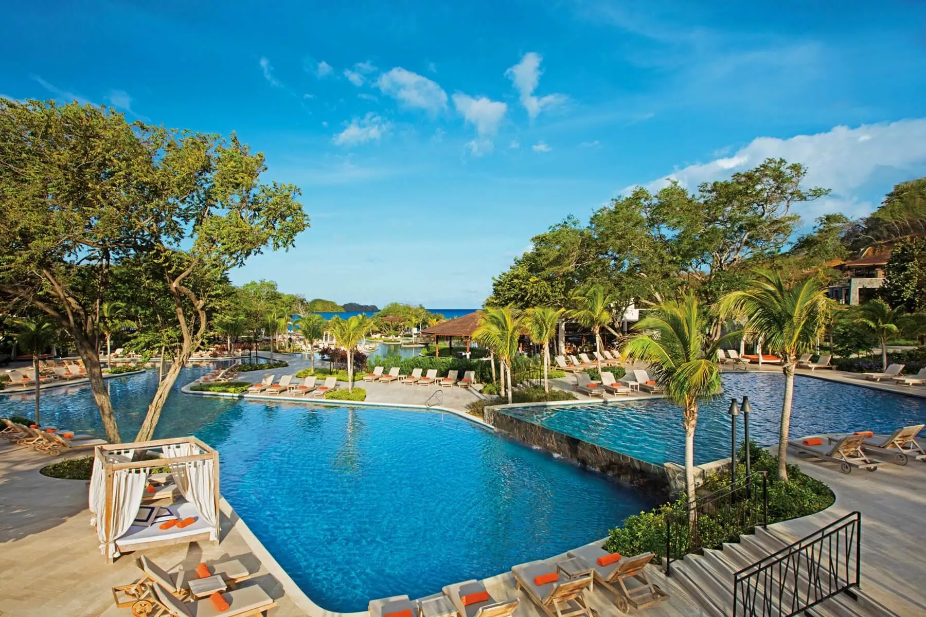 Beachfront next to pool ....