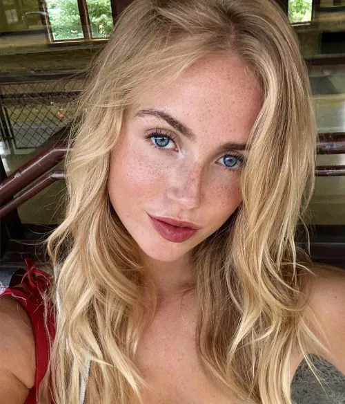 Blonde hair, blue eyes, selfie