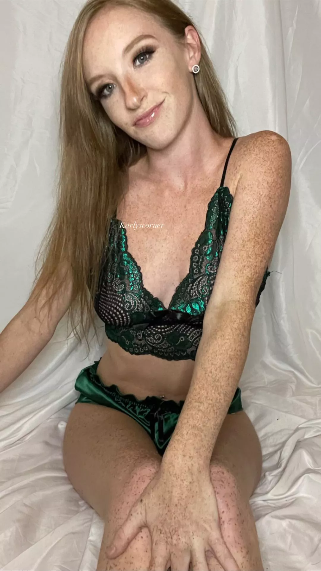 Green or red is my favorite on a redhead. What about you