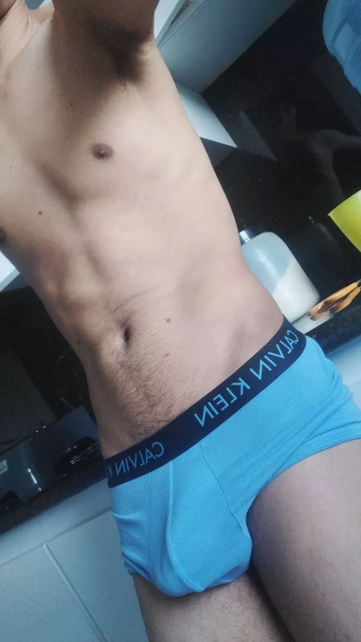 My roommate told me to put some shorts on, but he doesn't stop looking at my bulge, should I listen to him or just keep walking like this?