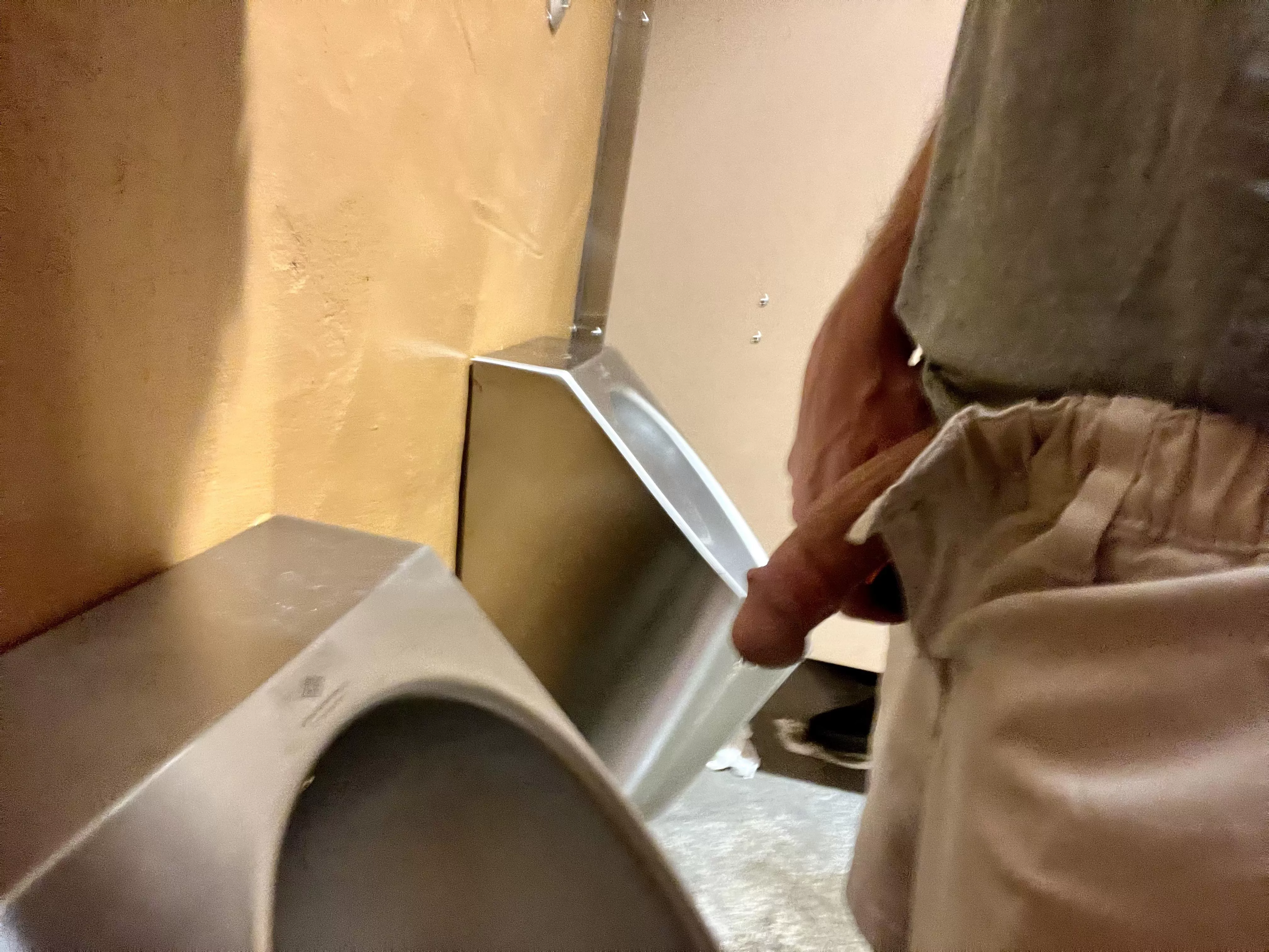 Left my growing cock out so the guy in the stall could see it when he walked out