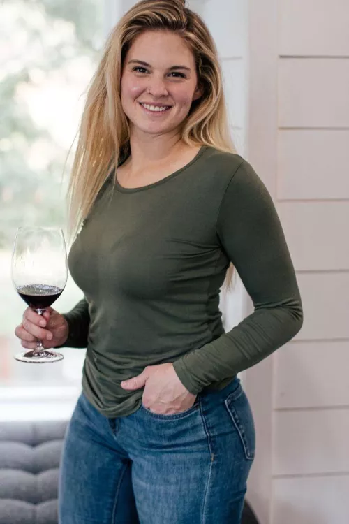 Cutie, wine, bra lines beneath a thin green top...what's not to love?