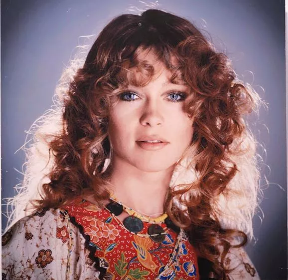 Marisol with her natural hair