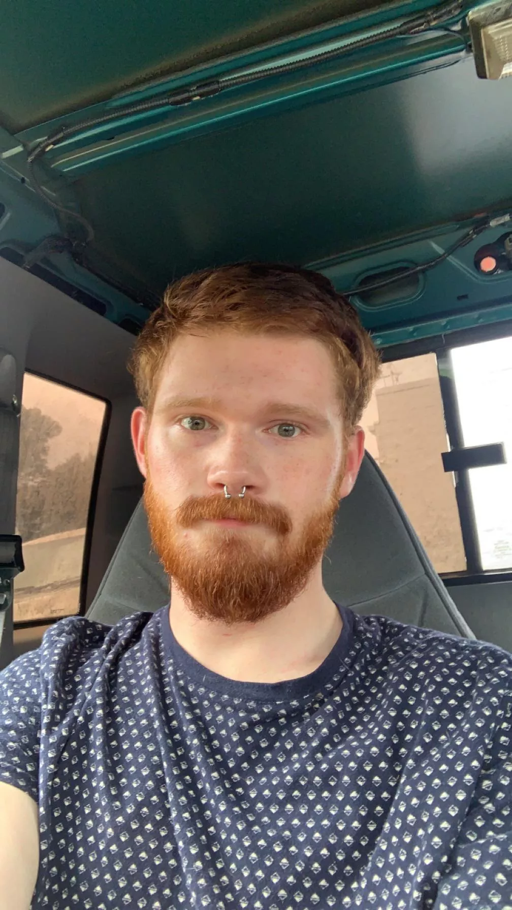 The face of someone who has a love hate relationship with driving. The face of someone who has a love hate relationship with driving.