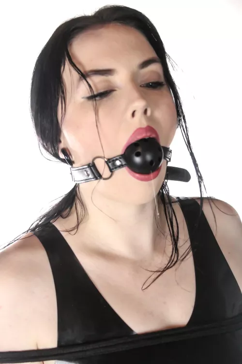 Gagged in latex