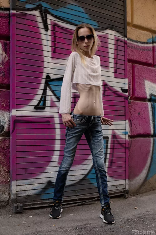 half covered ribs, but also visible under the top