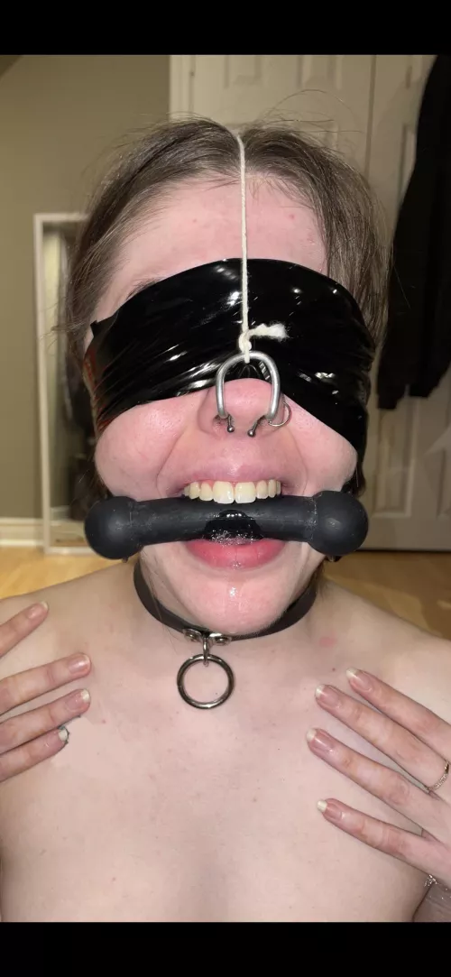 Drooling petgirl with a tight bit gag