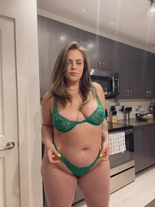 KC in high-waisted green lingerie