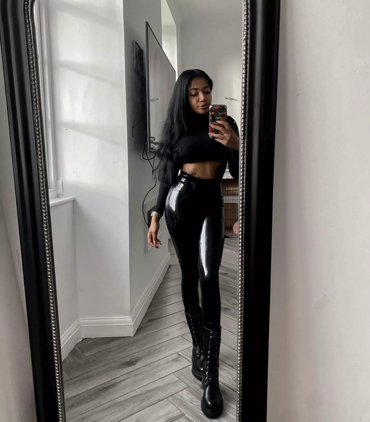 Latex leggings with boots and a normal crop as an everyday outfit