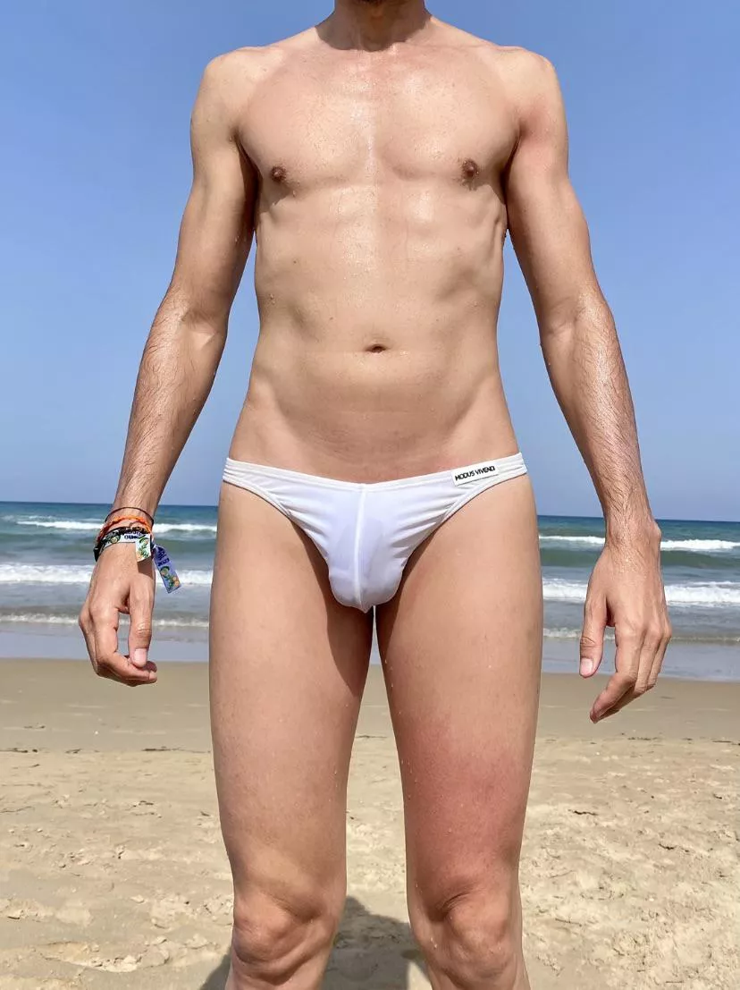Tiniest speedo ever wore in public, also see through. Would you approach yo take a closer look?