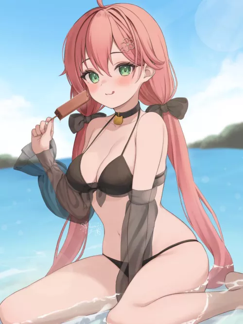 Enjoying a popsicle on her knees