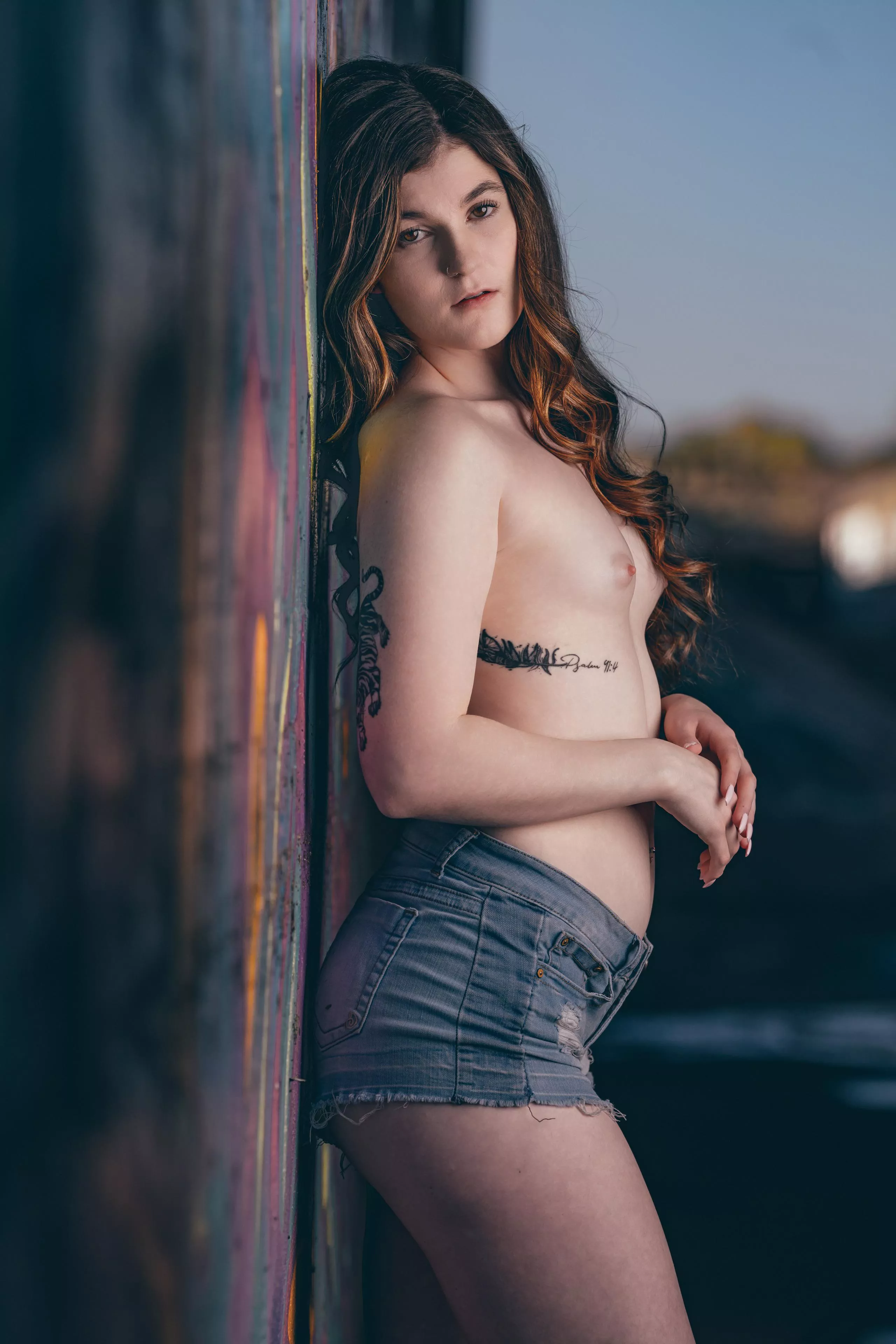 Natalie Showing Off in Front of Riverside Graffiti