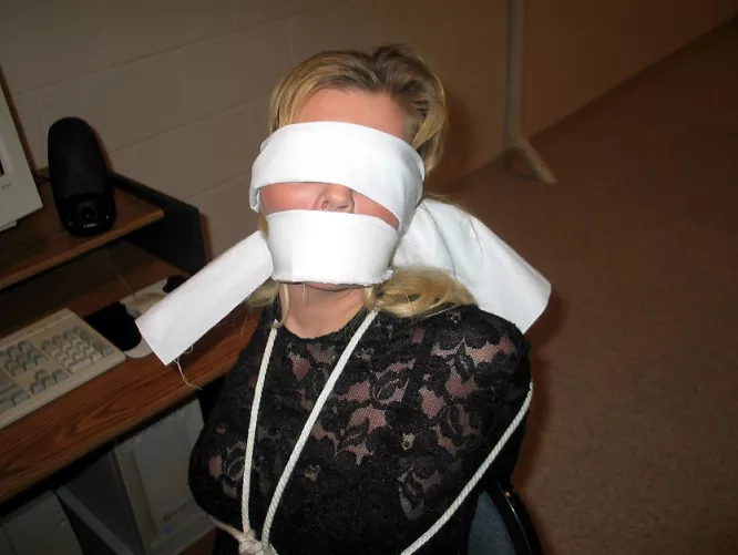 Gagged and blindfolded