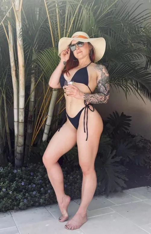 Inked bikini babe