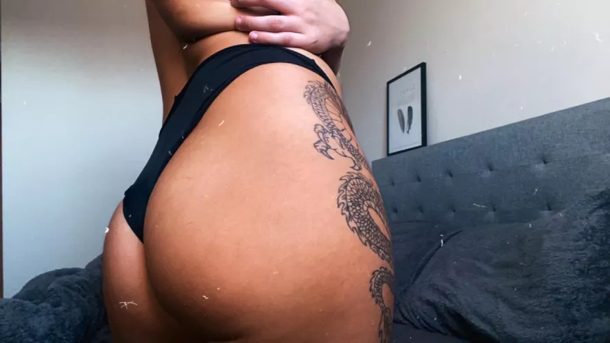 I think the dragon tattoo makes it better....