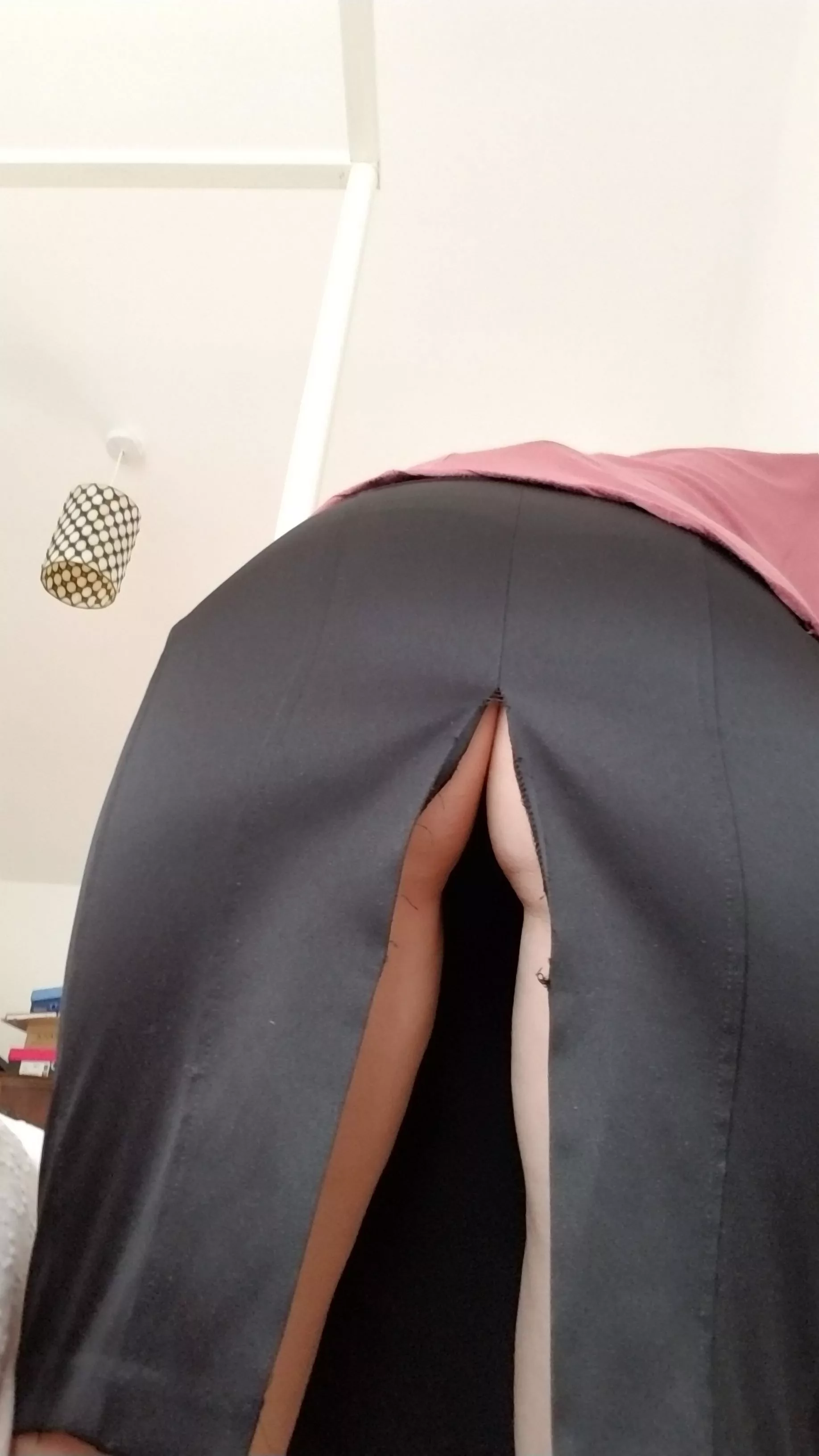 Split her skirt at work.