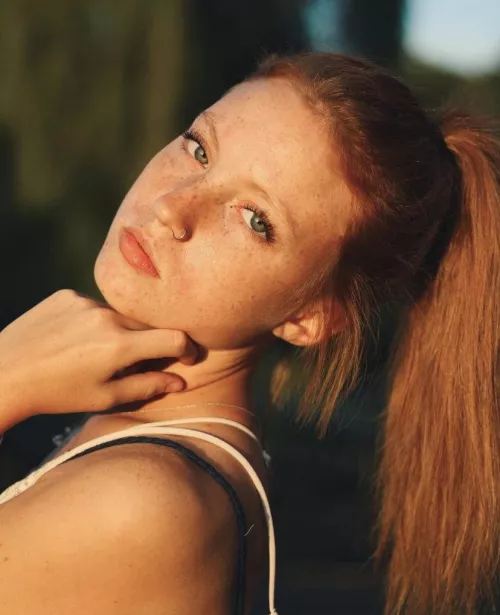 Red hair, blue eyes, and freckles