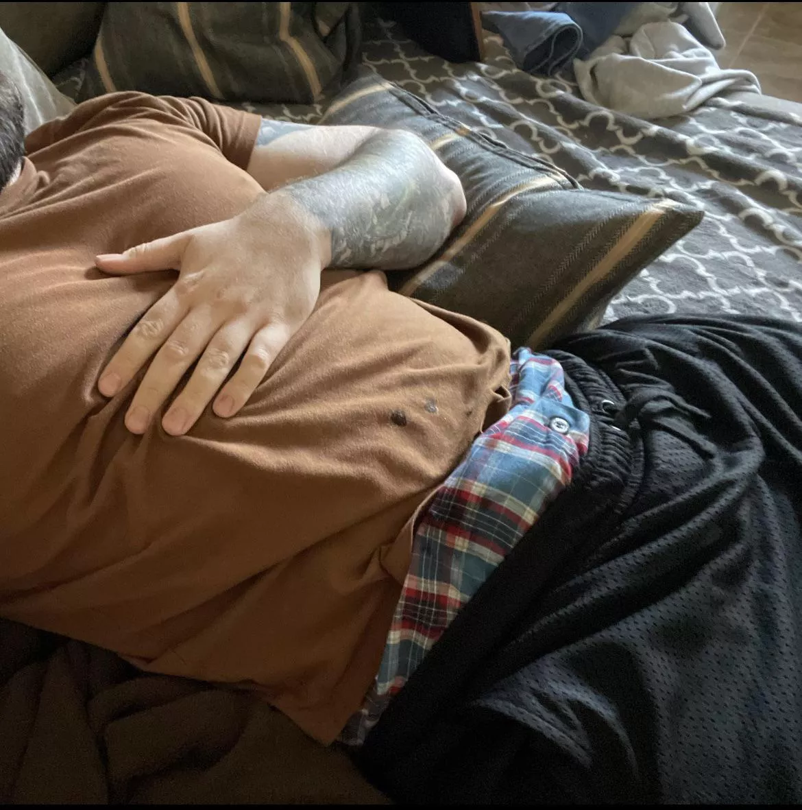 [33] boxers and gym shorts are a bold combo.