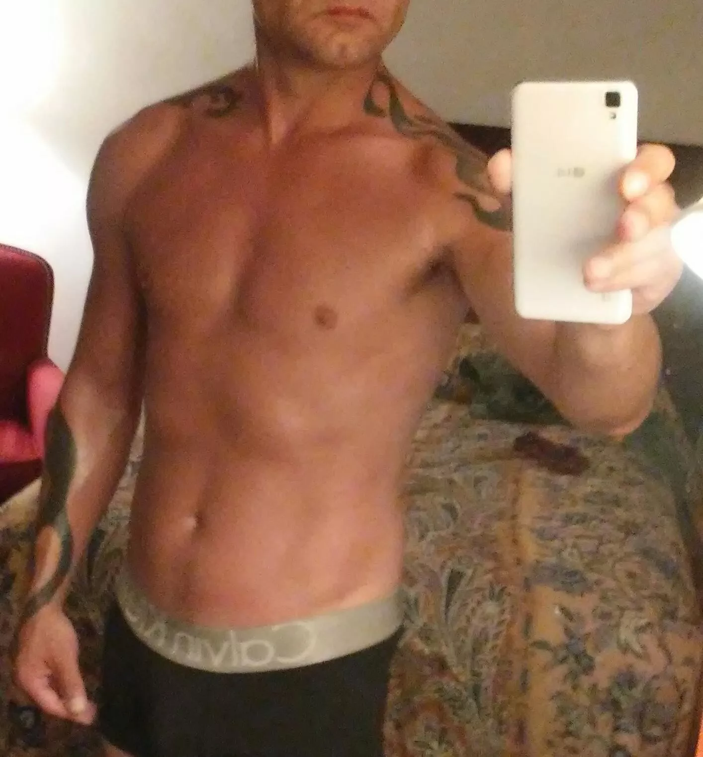 Tattooed and heavy handed.