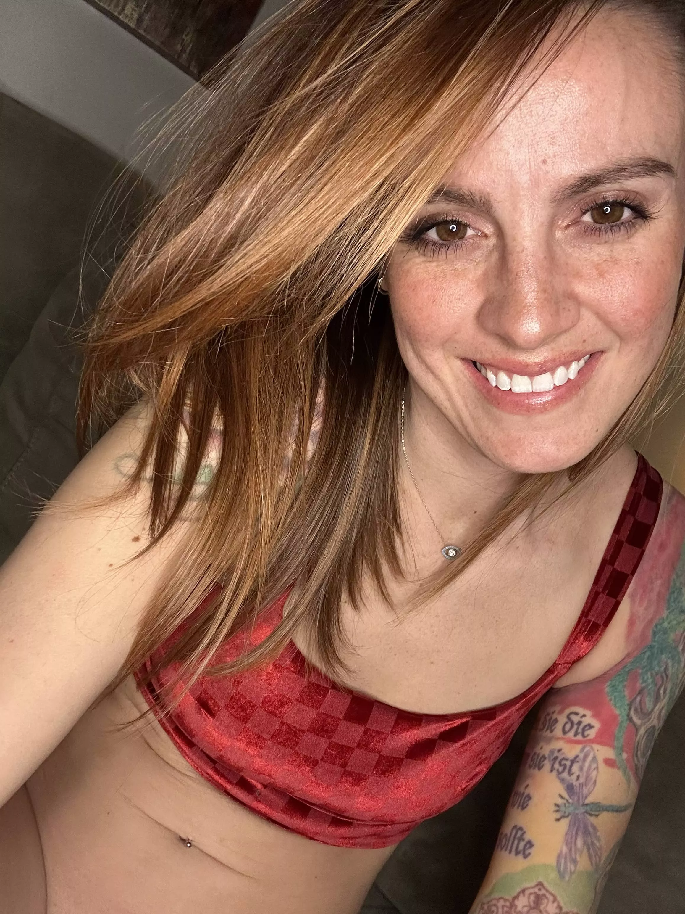 Teasing you through smile.