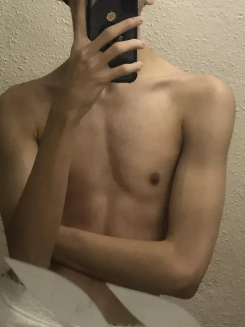 Bottom twink flexing his tiny abs