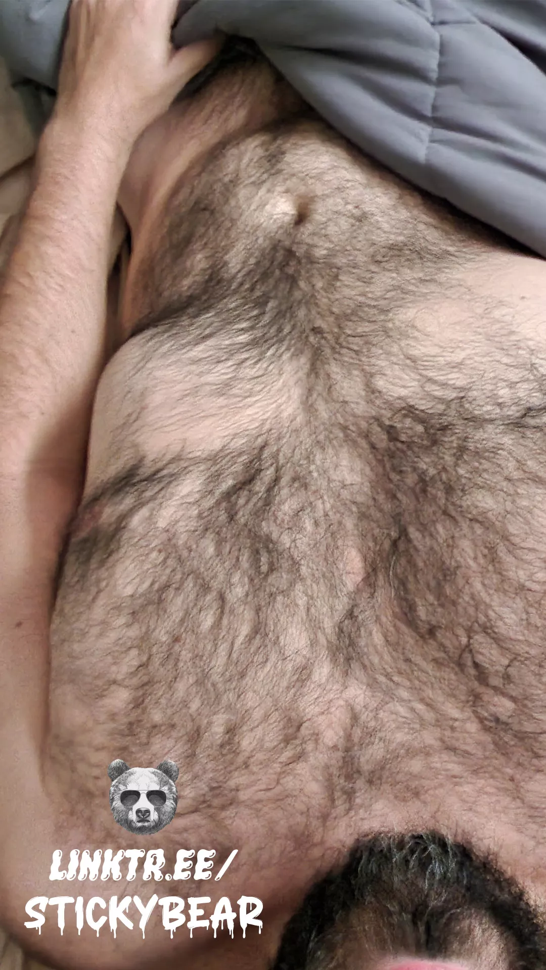 this bear is covered in hair, and posting his first content, can you dig?