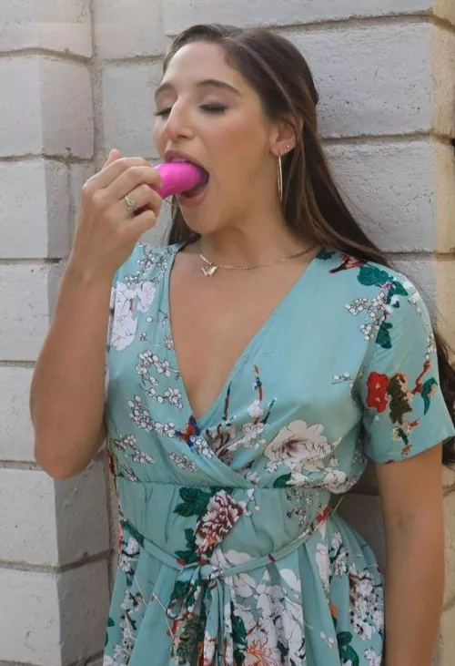 Abella tasting the toy that's been in her...