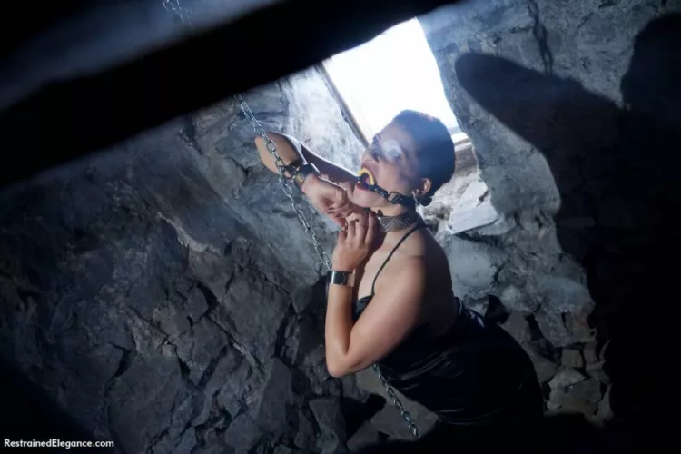 Cuffed in the Basement of the Stone House