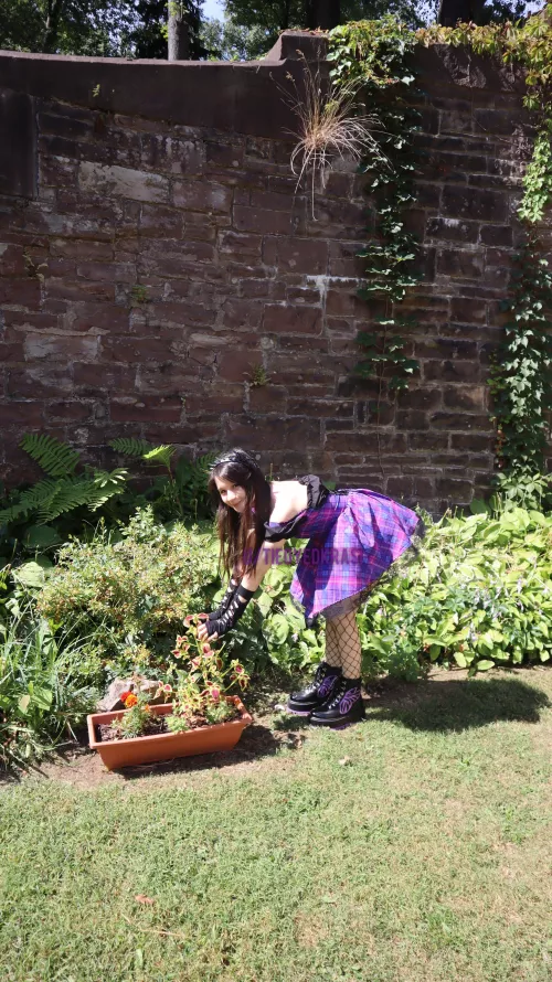 How's this pose as I tend to the outdoor plants?