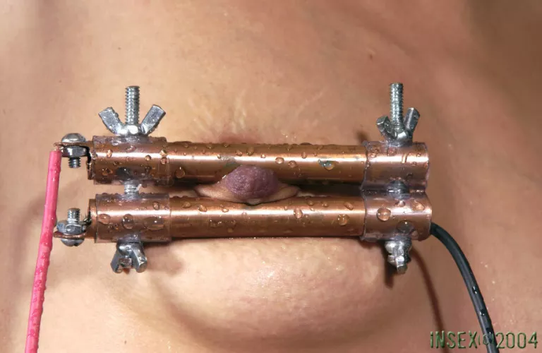 Why do PD sprayed water on top of her poor nipples after tightening the clamps?