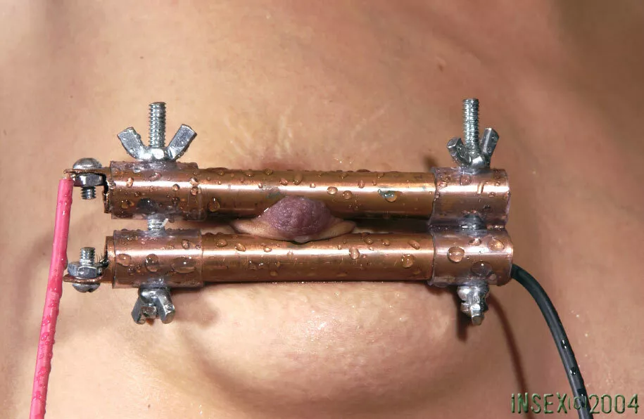 Why do PD sprayed water on top of her poor nipples after tightening the clamps?