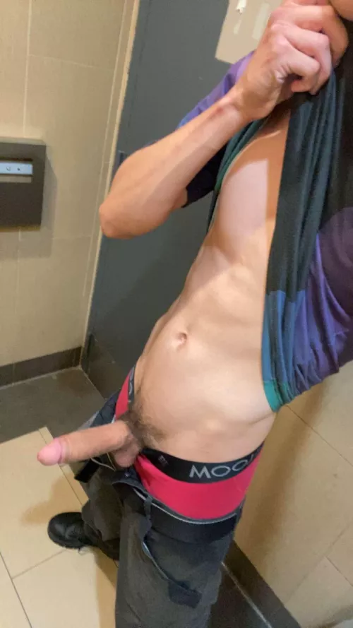 Young father hiding at work