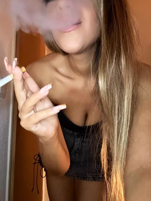 Blowing smoke in the air