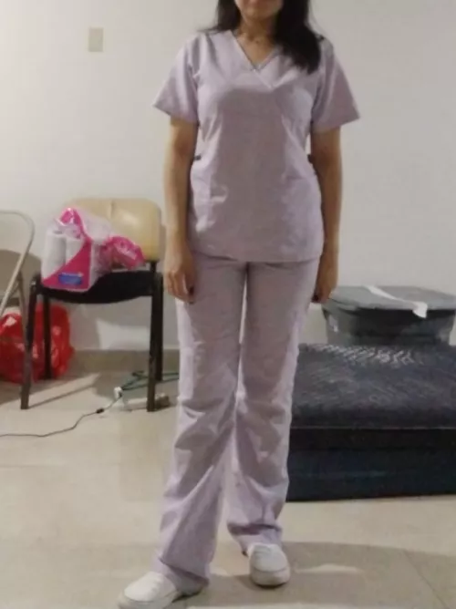 How do I look in lilac scrub? in turn