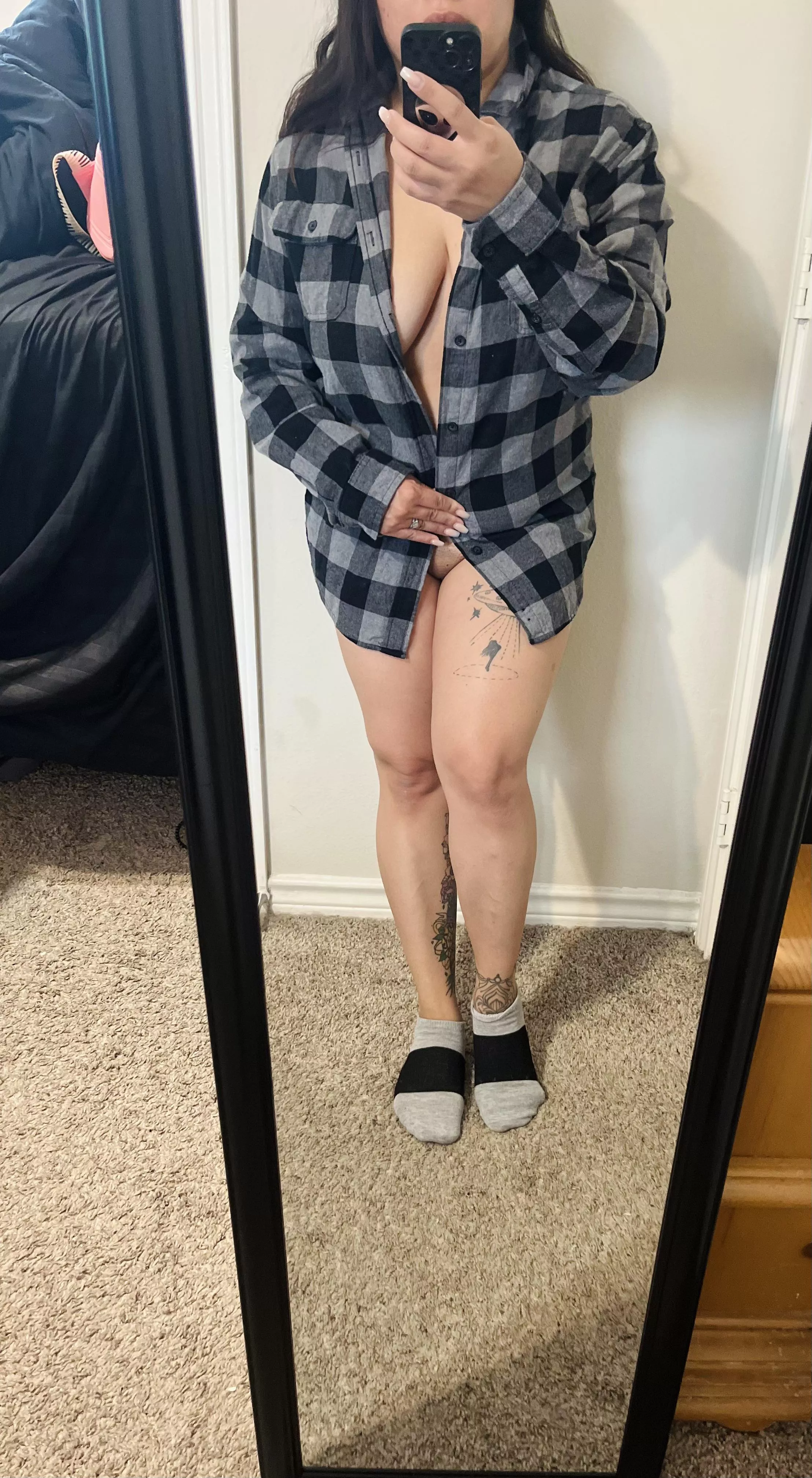 Longing in his shirt and ankle socks