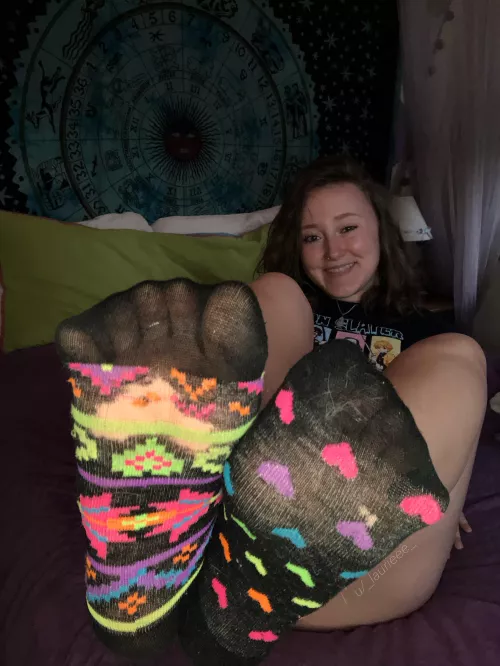 These socks are so worn that you can see through them [F]