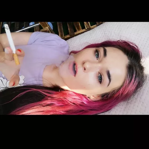 Laying down enjoying my first smoke of the day🌞