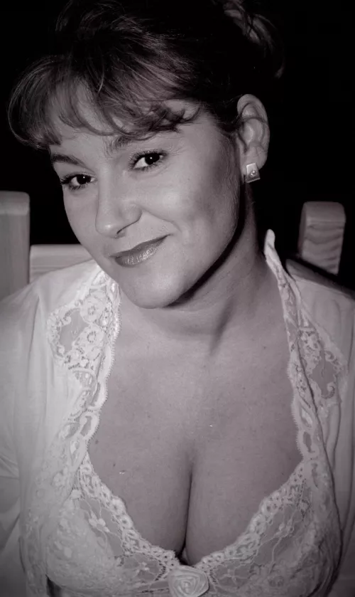 My busty Wife with her Big Tits Cleavage in a lace Top