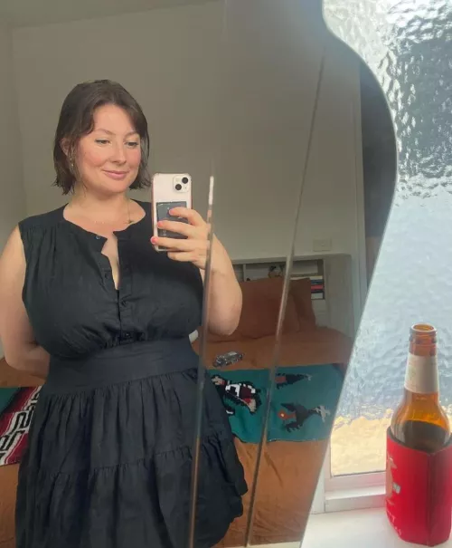 In a beautiful summer black dress