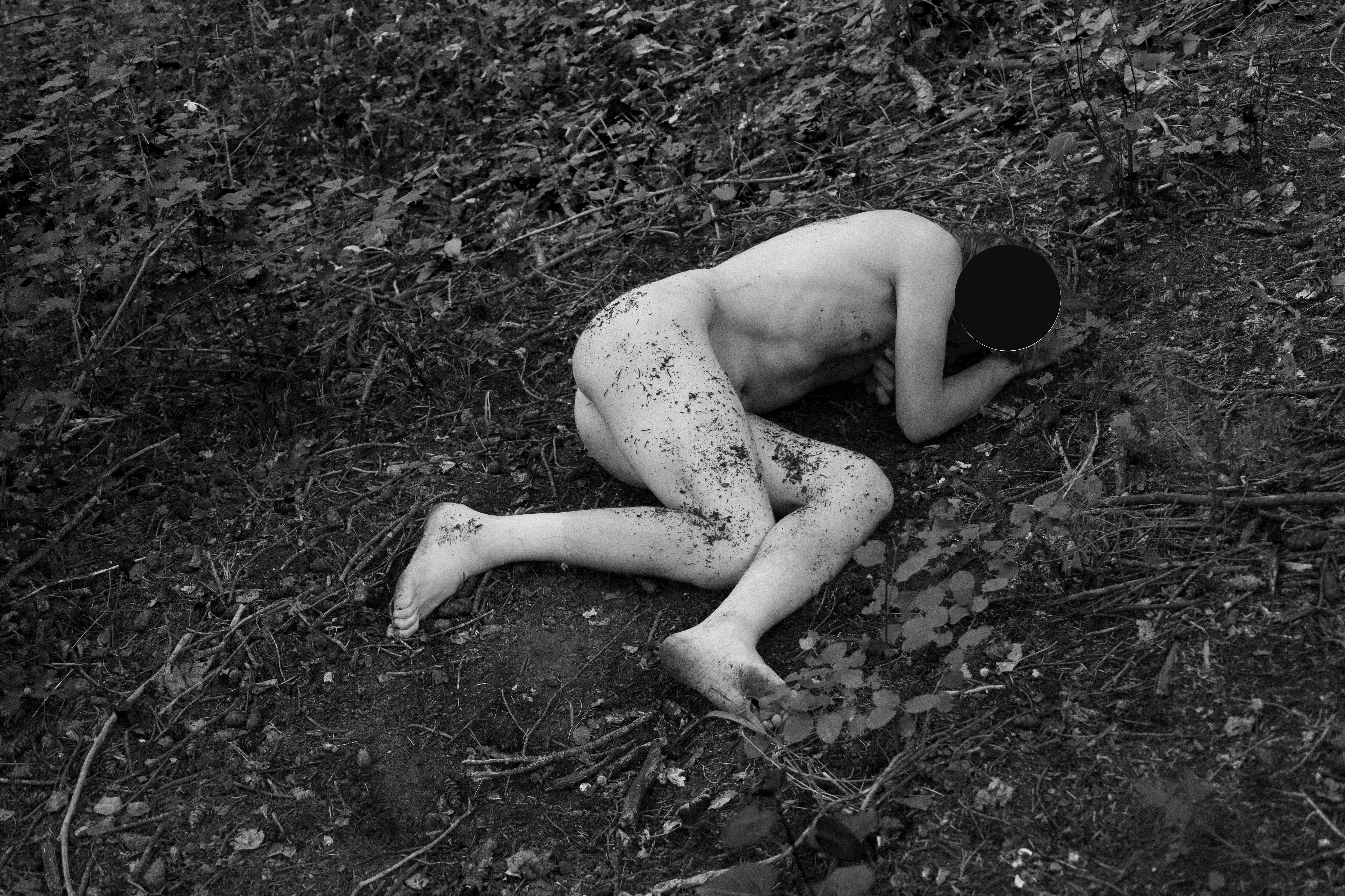 Down in the dirt. [Self portrait.]