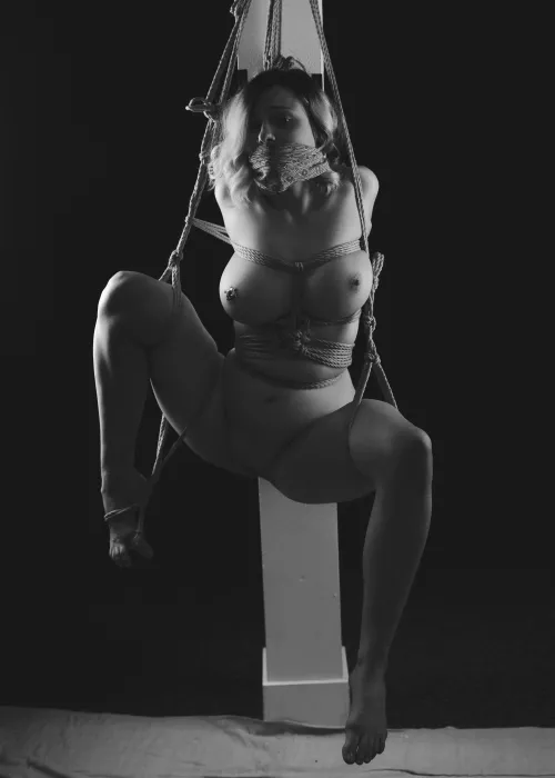 Post tied, naked and exposed